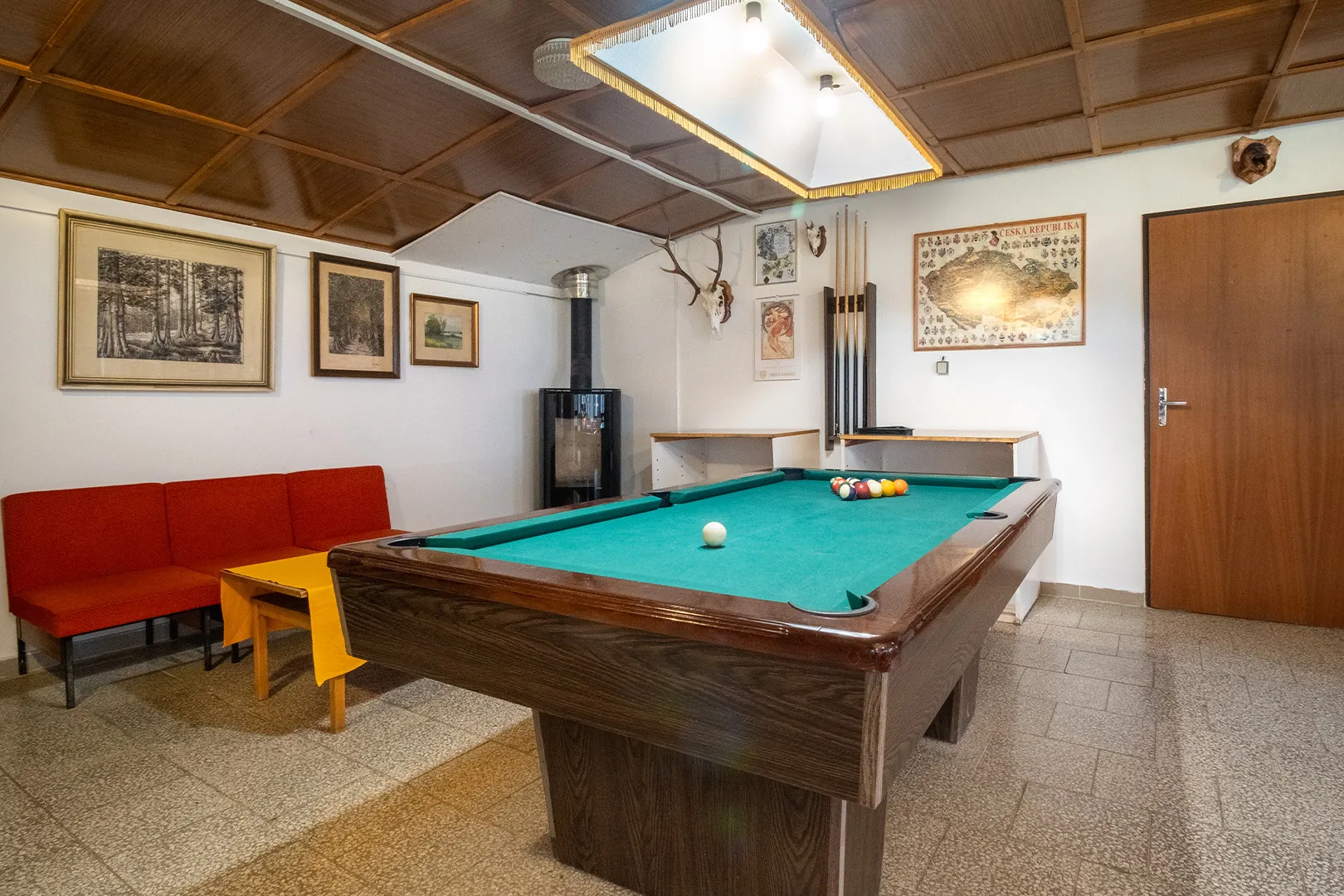 Clubhouse with a billiard table and fireplace