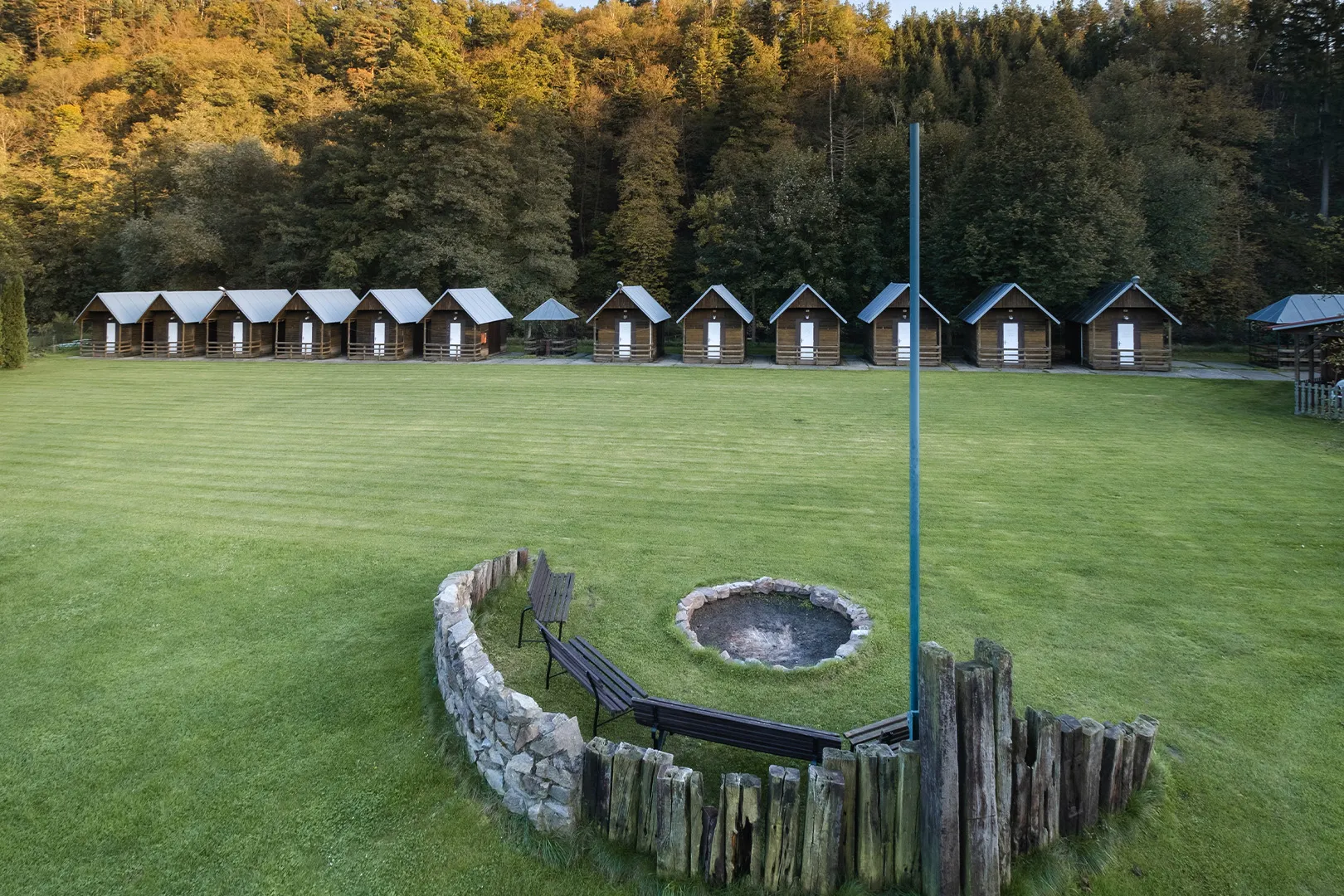 Campfire area with seating on the meadow